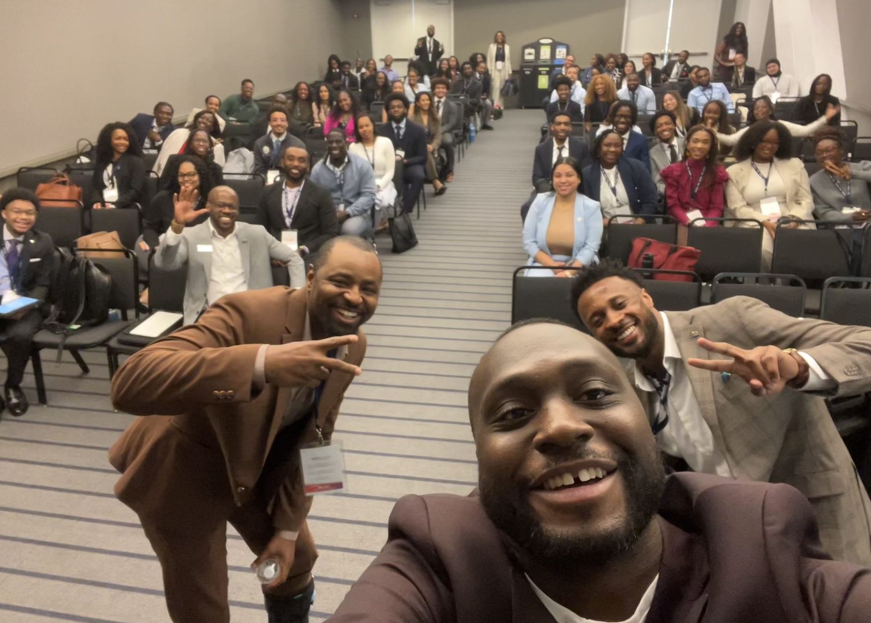 Boris Anyama with conference attendees.